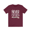 Printify T-Shirt Maroon / S "Never Underestimate A Girl With Hockey Stick" Unisex Jersey Tee